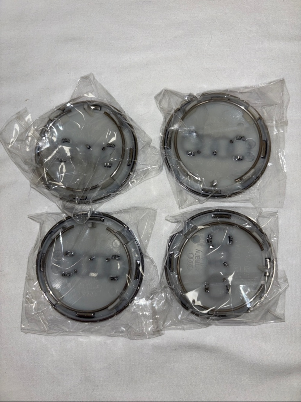 Audi Wheel Center Caps Set - Metallic Gray with Chrome Rings (4pcs) - Picture 3 of 5